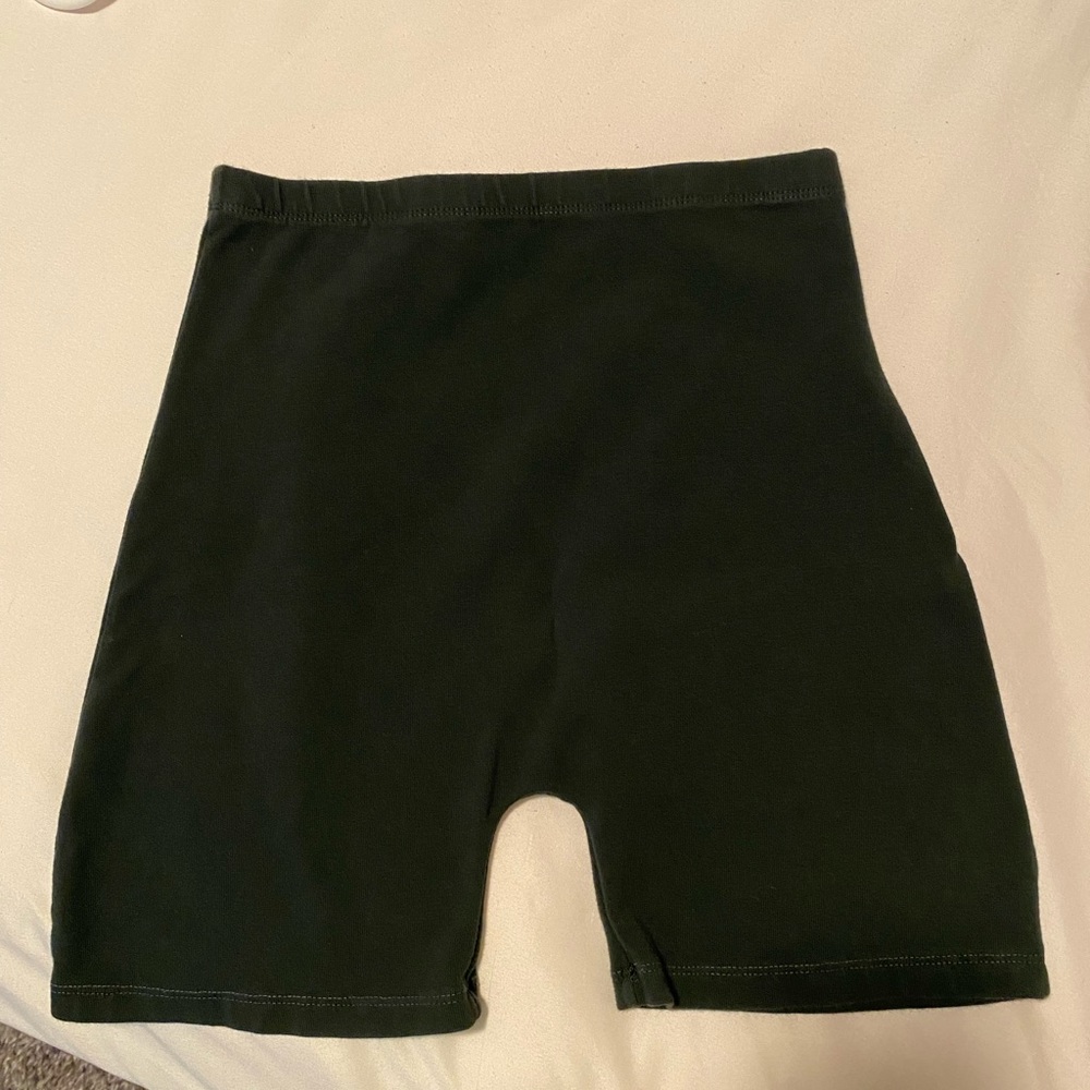(SOLD ON CURTSY) brandy melville dark green biker shorts